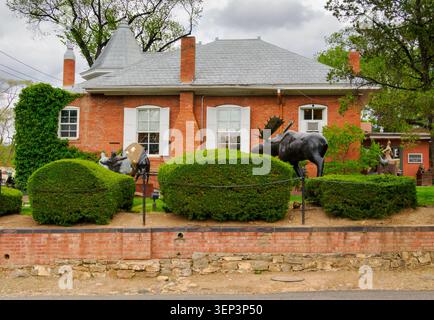 Santa Fe, NM - May 6 , 2026 - A sculptor of large a bronze animals appears to have a moose in his garden Stock Photo