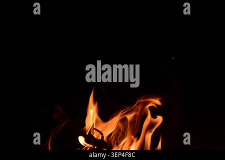 sparks and fire on black background Stock Photo