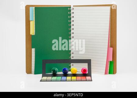 Notebook and markers ready for brainstorming and organization, highlighting themes of creativity, focus, and back to school preparations against a min Stock Photo