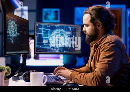 Admin using computer for artificial intelligence computing simulating human brain through self learning algorithms while employee working with AI deep neural networks on desktop PC. Stock Photo