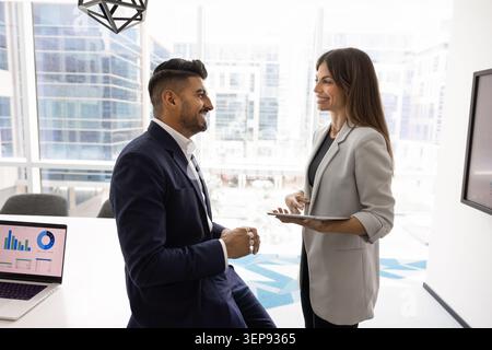Business colleagues discussing strategy in modern office Stock Photo