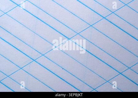 Soft white paper shows delicate blue lines forming an elegant diagonal pattern. Stock Photo