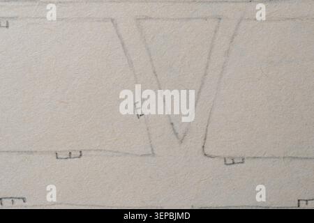 Delicate doodles show triangular forms and lines on a soft, light paper surface. Stock Photo