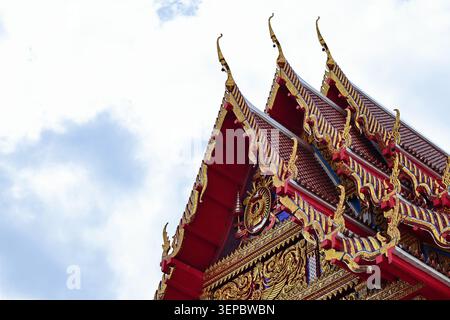 Ornate Multi Tiered Roof of Thai Buddhist Temple Wat Don Mueang Stock Photo