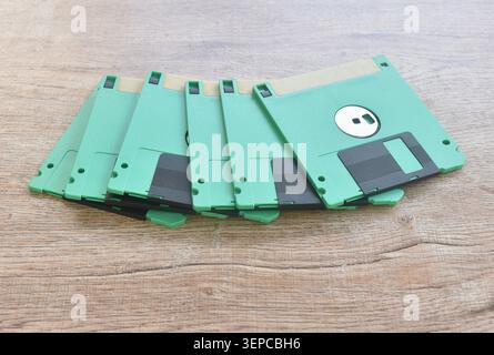 floppy disk old technology for saving data arranging on table Stock Photo