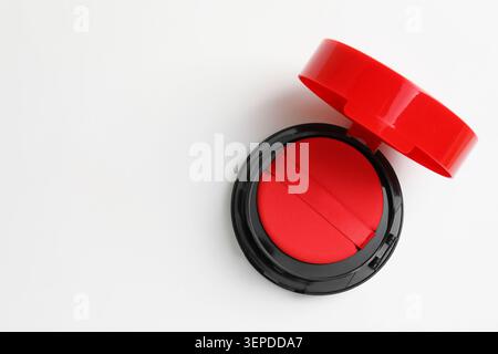 Cushion foundation on white background, top view. Space for text Stock Photo