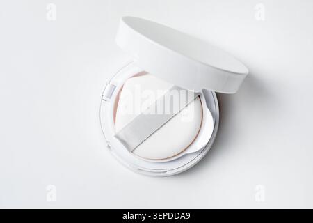 Cushion foundation on white background, top view. Makeup product Stock Photo