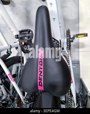 Voronezh, Russia - April 11, 2026.A close up shot shows a black and pink Denton bicycle saddle installed on a bike. This bike is displayed in a sporti Stock Photo