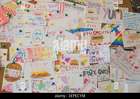Five guys notice board Stock Photo