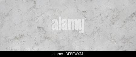 Grey concrete wall surface displaying rough plaster texture and natural imperfections Stock Photo