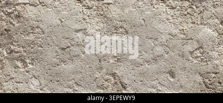 Rough gray concrete wall surface showing a textured background Stock Photo