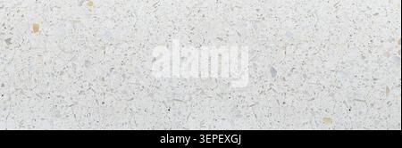 Terrazzo pattern creating a textured background with white, gray, and brown flecks Stock Photo