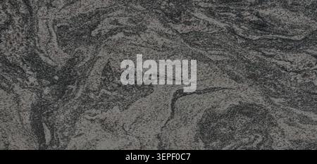 Gray natural granite surface showing detailed stone texture and abstract pattern Stock Photo