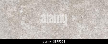 Distressed gray plaster wall forming a textured background surface Stock Photo