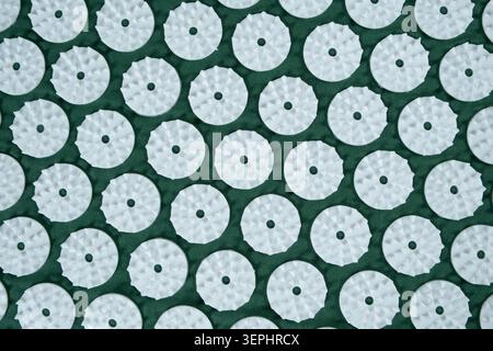 Macro abstract background of green acupuncture massage mat needles Stock Photo