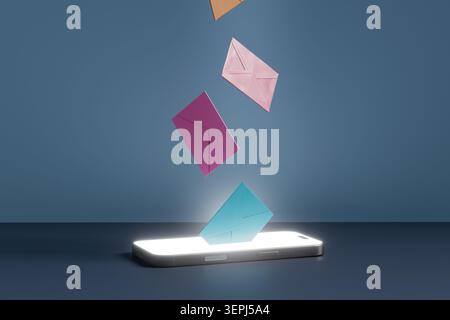 Colorful envelopes symbolizing incoming messages dropping into a smartphone, representing digital communication and online notifications Stock Photo
