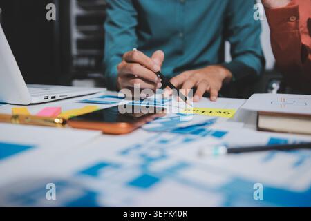 UI designer and UX developer brainstorm idea to design the application appearance in the early stage. Creative digital development agency. UX UI conce Stock Photo