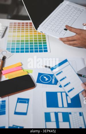 UI designer and UX developer brainstorm idea to design the application appearance in the early stage. Creative digital development agency. UX UI conce Stock Photo