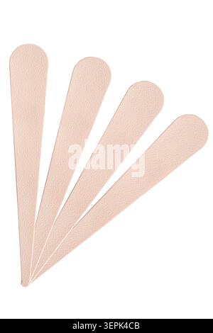 Four blank pink paper fragrance blotter strips isolated on white background Stock Photo
