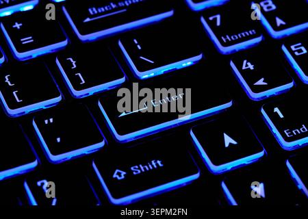 Close-up of laptop keyboard with Enter key Stock Photo
