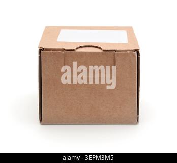 Closed cardboard box isolated on white. Stock Photo
