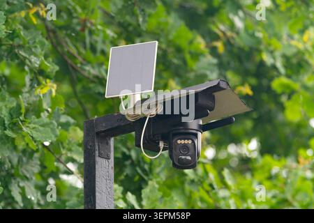 Wireless solar powered security camera Stock Photo