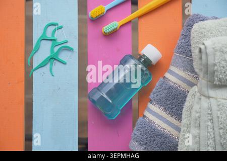 Daily dental care items on colorful table Stock Photo