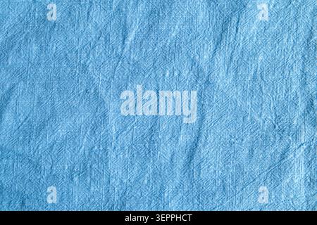 Soft blue fabric texture with subtle wrinkles and woven detail for background use Stock Photo