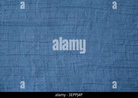 Blue woven fabric texture background with subtle grid pattern for design use Stock Photo