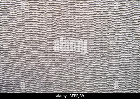 Neutral beige fabric texture with embossed linear pattern ideal for background and textile design Stock Photo