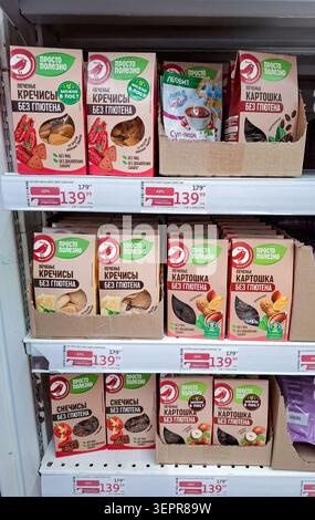 MOSCOW, Russia - March 21, 2026.A variety of gluten free snacks and cookies from Prosto Polezno are arranged neatly on shelves in a supermarket. Red d Stock Photo