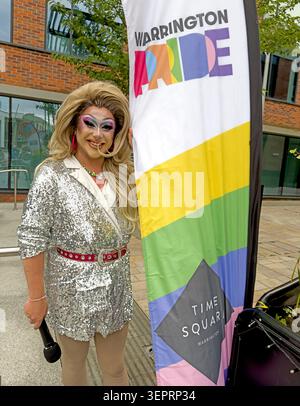 Kiki Inferno in a sparkling silver costume during the Warrington Pride celebrations at Time Square, Warrington, 13 June 2026 Stock Photo