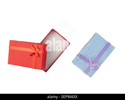 empty baby blue and red rectangular cardboard jewelry boxes with ribbon boows  isolated on a white background flat lay Stock Photo
