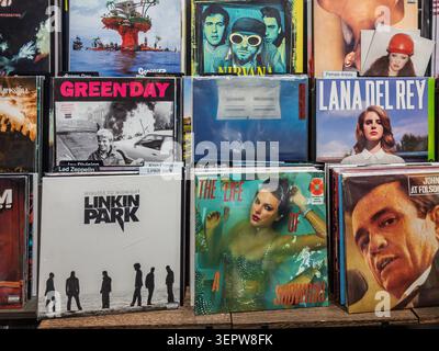 Rack of vinyl LPs for sale, Magazine Heaven, Rushden Lakes Shopping Centre, Northamptonshire, UK Stock Photo