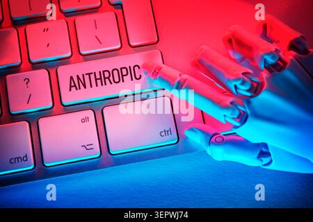 FOTOMONTAGE, Roboterhand drückt Taste mit Aufschrift Anthropic auf einer Computertastatur Hamburg Hamburg Deutschland ** NUR FÜR REDAKTIONELLE ZWECKE ** EDITORIAL USE ONLY ** *** PHOTOMONTAGE Stock Photo