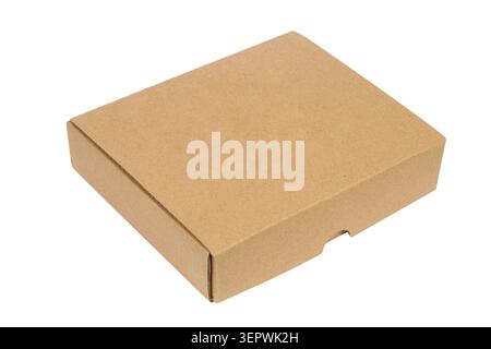 Plain brown cardboard box isolated on white background. Flat cardboard box close-up. Stock Photo