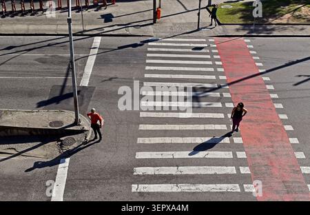 RIO DE JANEIRO, BRAZIL - June 19, 2025: Pedestrian crossing and people waiting to cross the street Stock Photo