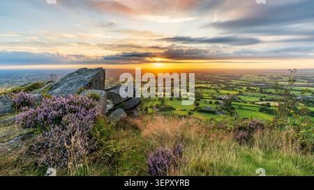 Sunset view from The Cloud near to Congleton looking over the Cheshire Plain. Stock Photo