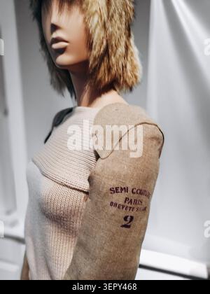 Paris, France - March 18, 2018: Close-up of a mannequin wearing a knitted garment with padded sleeves and printed textile details at the Margiela Gall Stock Photo