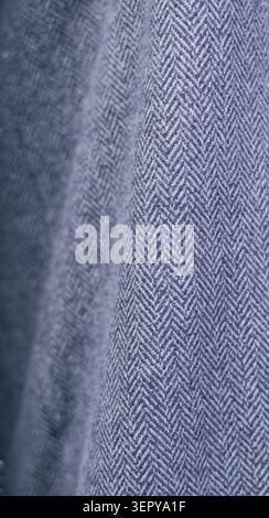 Grey herringbone wool fabric texture close up Stock Photo