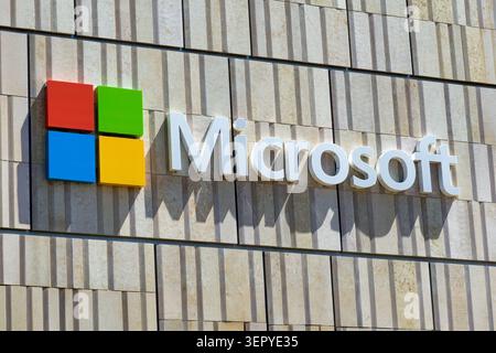Mountain View, CA, USA — June 7, 2026: Microsoft regional office sign displayed in front of a modern glass building in Silicon Valley. Stock Photo