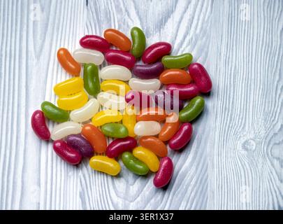 Selection of multicoloured loose jellybeans. Stock Photo