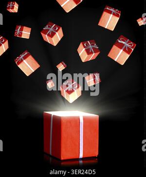 Red gift boxes flying in the dark Stock Photo