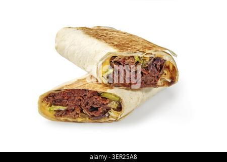 Two halves of delicious juicy shawarma sandwich with beef, pickles and cheddar cheese isolated on white background Stock Photo