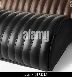 Close-up of stitched black and brown leather upholstery, highlighting craftsmanship and luxurious texture for comfortable furniture Stock Photo