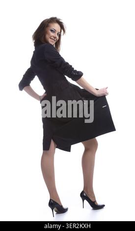 Beautiful dark haired model poses on white Stock Photo