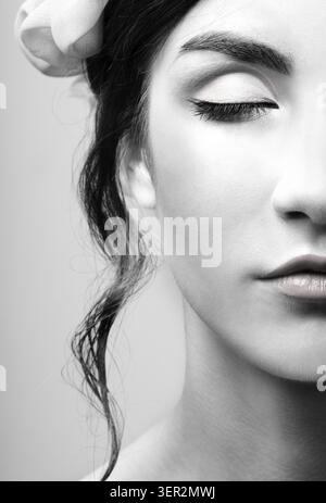 Portrait of beautiful dark haired slavonic model's half face Stock Photo