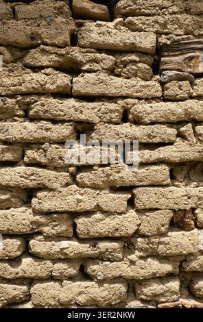 Background of old wall made of adobe or mudbrick masonry Stock Photo