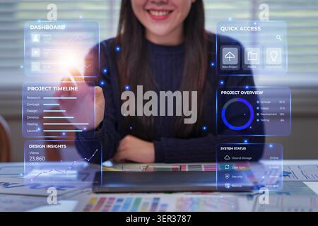 Asian businesswoman managing project timeline on holographic dashboard for business technology Stock Photo
