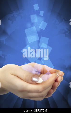 Magic buttons flying out of the hands against the backdrop of the globe Stock Photo